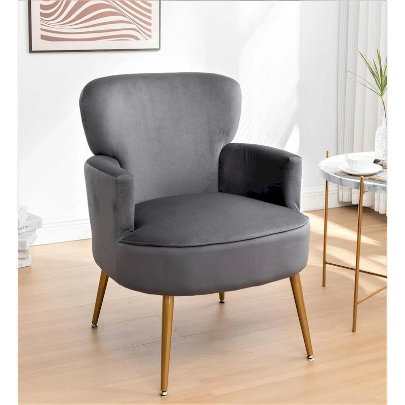 Elegante poltrona in velluto con gambe in metallo dorato