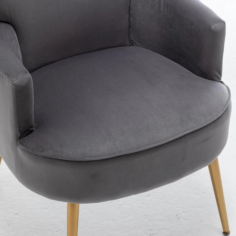 Elegante poltrona in velluto con gambe in metallo dorato