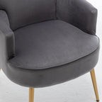Elegante poltrona in velluto con gambe in metallo dorato