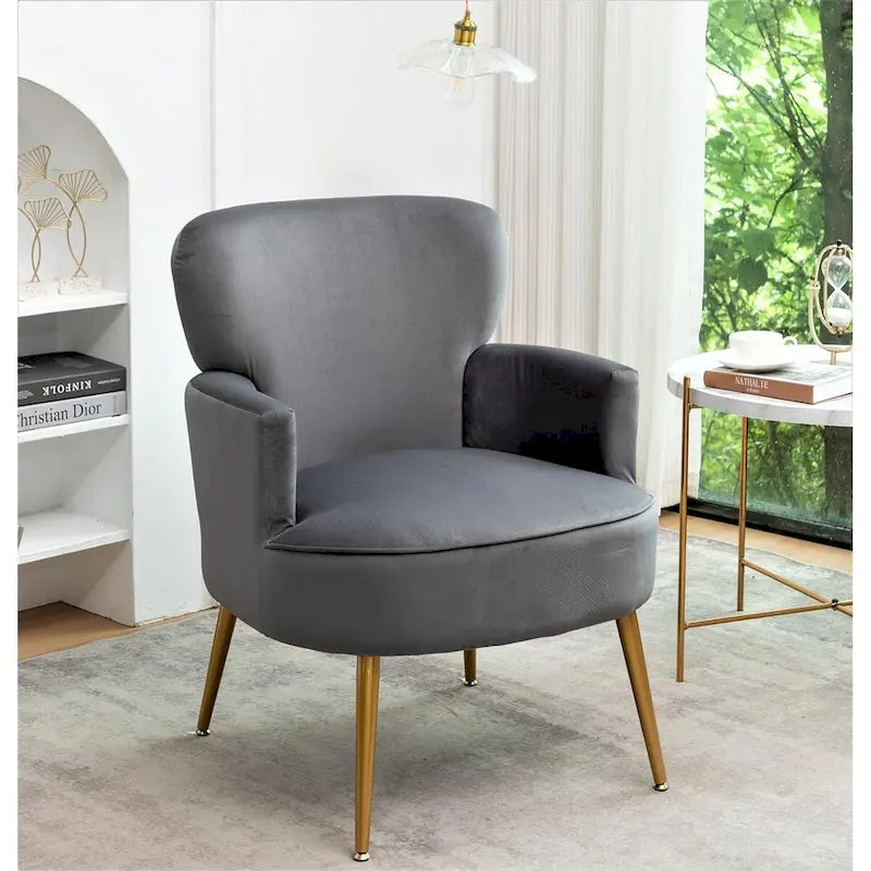 Elegante poltrona in velluto con gambe in metallo dorato