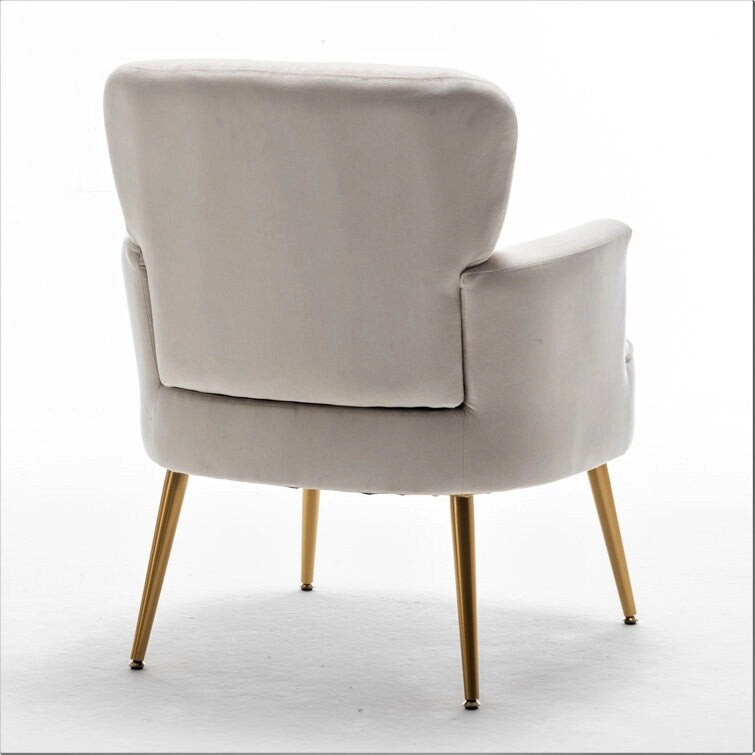 Elegante poltrona in velluto con gambe in metallo dorato