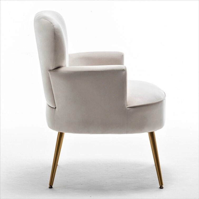 Elegante poltrona in velluto con gambe in metallo dorato