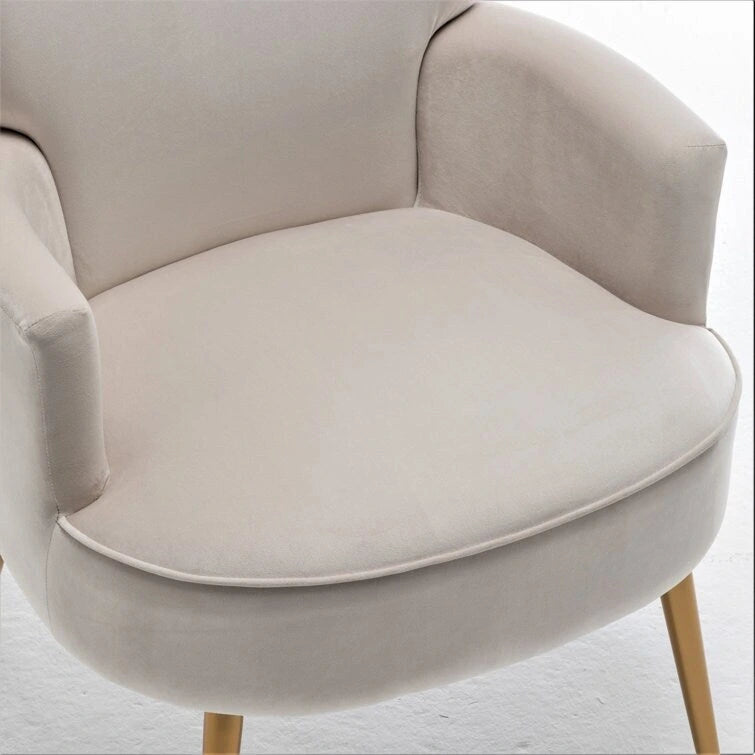 Elegante poltrona in velluto con gambe in metallo dorato