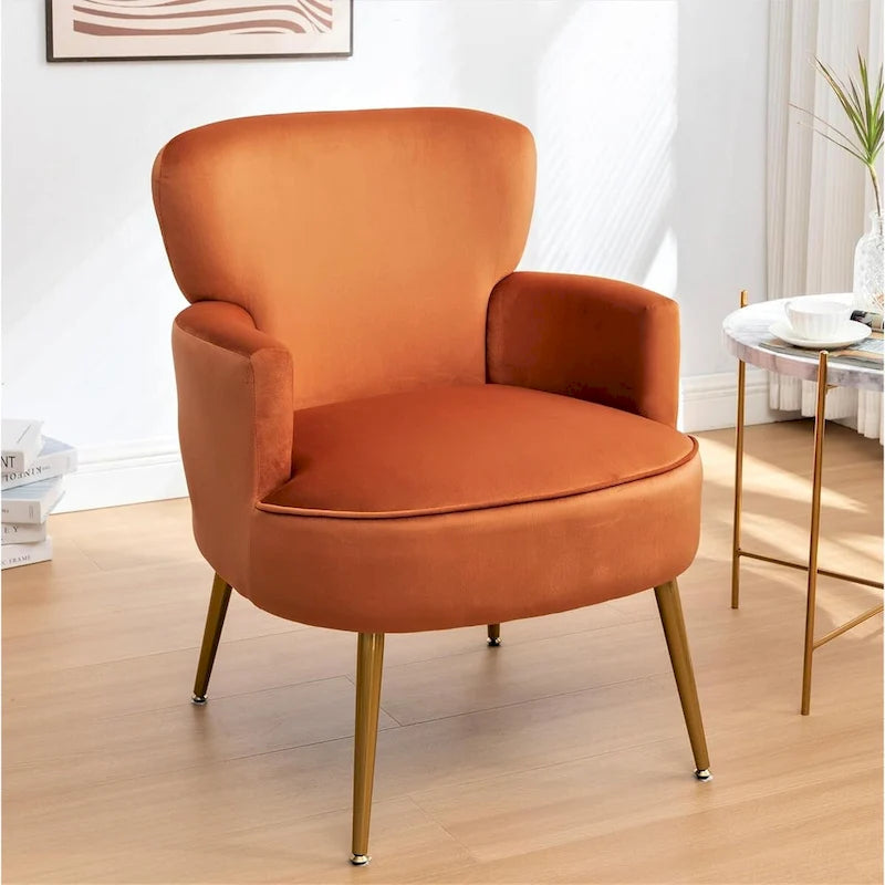 Elegante poltrona in velluto con gambe in metallo dorato